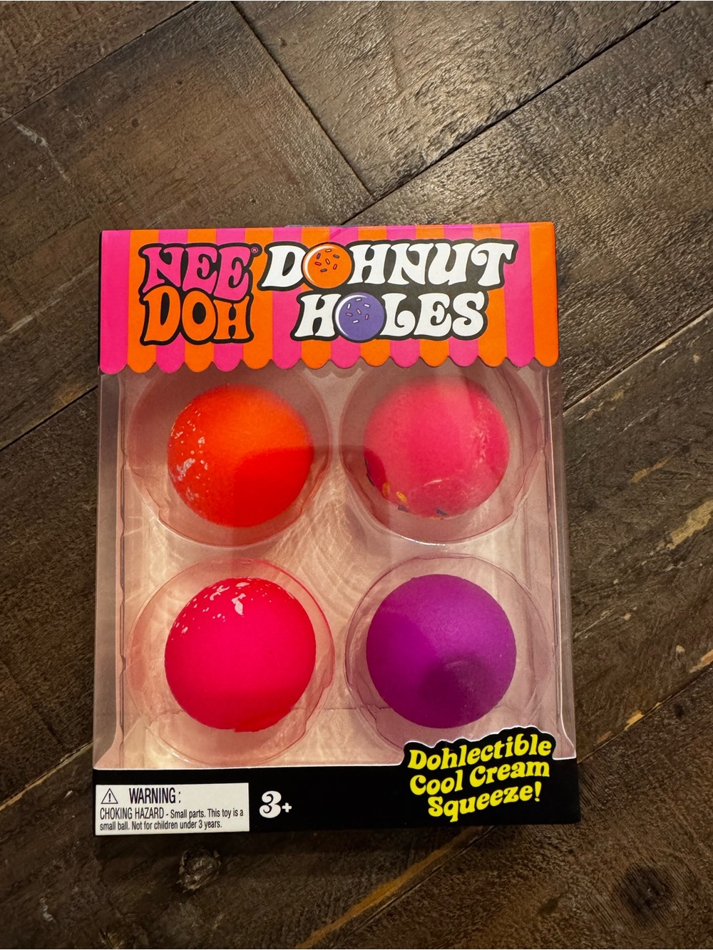 Needoh Donut Holes 4-Pack Squeeze Toys - Pink, Orange, Purple